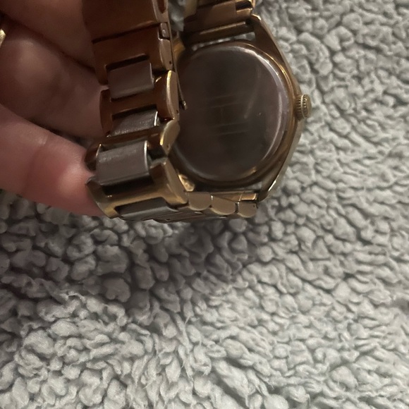 Tommy Hilfiger. Big round watch with glitter stones around it. - Picture 6 of 6